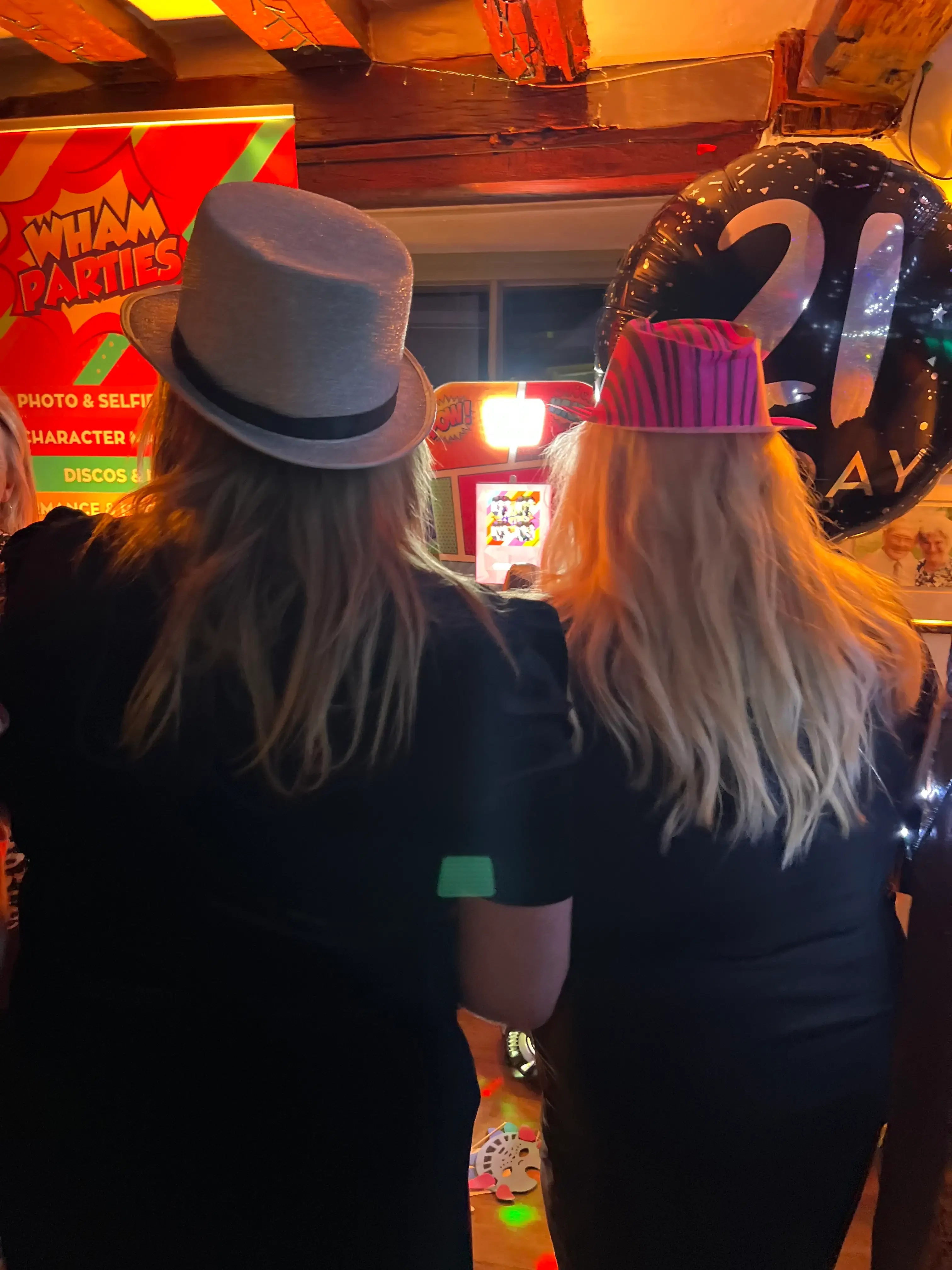 Guests celebrating together at a WHAM party